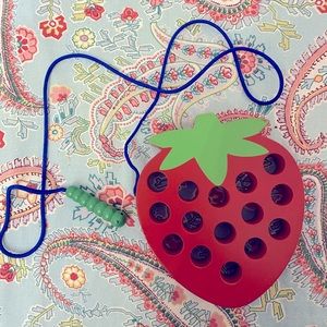 Montessori toy threading activity